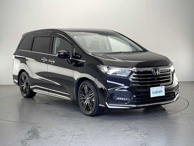 ホンダ オデッセイ ハイブリッド e:HEVアブソルート EX 長野県 2021(令3)年 2.7万km プレミアムスパークルブラックパール 純正メモリナビ&フルセグTV&CD&DVD&BT/ホンダセンシング/アダプティブクルーズコントロール/レーンキープアシスト/衝突軽減ブレーキ/コーナーセンサー/ブラインドスポットモニター/先行車発進告知/標識認識表示/両側パワースライドドア/パワーバックドア/ハーフレザシート/前席シートヒーター/ステアリングスイッチ/2列目サンシェード/オットマン/ウォークスルー/全方位カメラ/ビルトインETC2.0/LEDヘッドライト/オートライト/電動格納ミラー/ウィンカーミラー/電動ホールド/ブレーキホールド/純正18インチAW装着/純正フロアマット/プッシュスタート/スマートキー/スペアキー1本/取扱説明書/保証書