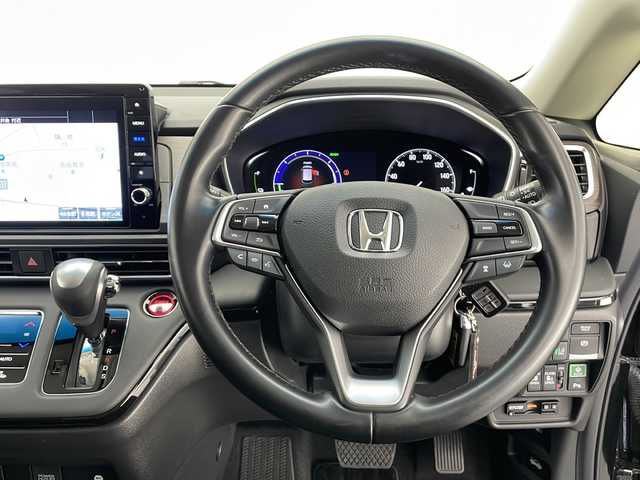 ホンダ オデッセイ ハイブリッド e:HEVアブソルート EX 長野県 2021(令3)年 2.7万km プレミアムスパークルブラックパール 純正メモリナビ&フルセグTV&CD&DVD&BT/ホンダセンシング/アダプティブクルーズコントロール/レーンキープアシスト/衝突軽減ブレーキ/コーナーセンサー/ブラインドスポットモニター/先行車発進告知/標識認識表示/両側パワースライドドア/パワーバックドア/ハーフレザシート/前席シートヒーター/ステアリングスイッチ/2列目サンシェード/オットマン/ウォークスルー/全方位カメラ/ビルトインETC2.0/LEDヘッドライト/オートライト/電動格納ミラー/ウィンカーミラー/電動ホールド/ブレーキホールド/純正18インチAW装着/純正フロアマット/プッシュスタート/スマートキー/スペアキー1本/取扱説明書/保証書