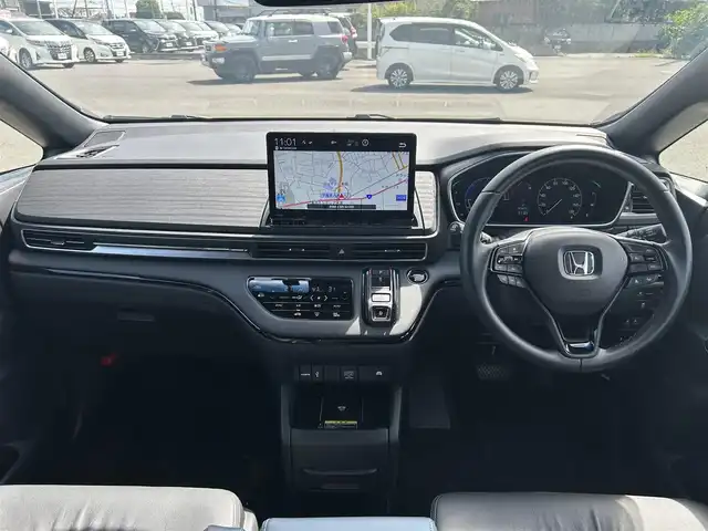 ホンダ オデッセイ ハイブリッド e:HEVアブソルート EXブラックED 茨城県 2023(令5)年 1.4万km プレミアムヴィーナスブラックP 純正15.6インチフリップダウンモニター/ホンダセンシング/-衝突軽減ブレーキ/-誤発信抑制機能/-歩行者事故軽減ステアリング/-レーンキープアシスト/-アダプティブクルーズコントロール/-車線維持システム/純正11.4インチナビ/マルチビューカメラ/バックカメラ/両側パワースライドドア/LEDヘッドライト/オートライト/レザーシート/シートヒーター/パワーシート/2列目オットマン/ワイアレス充電/USBチャージャー/ビルトインETC/スマートキー/プッシュスタート/禁煙車