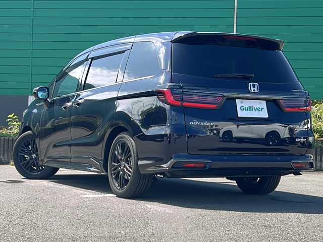 ホンダ オデッセイ ハイブリッド e:HEVアブソルート EXブラックED 茨城県 2023(令5)年 1.4万km プレミアムヴィーナスブラックP 純正15.6インチフリップダウンモニター/ホンダセンシング/-衝突軽減ブレーキ/-誤発信抑制機能/-歩行者事故軽減ステアリング/-レーンキープアシスト/-アダプティブクルーズコントロール/-車線維持システム/純正11.4インチナビ/マルチビューカメラ/バックカメラ/両側パワースライドドア/LEDヘッドライト/オートライト/レザーシート/シートヒーター/パワーシート/2列目オットマン/ワイアレス充電/USBチャージャー/ビルトインETC/スマートキー/プッシュスタート/禁煙車
