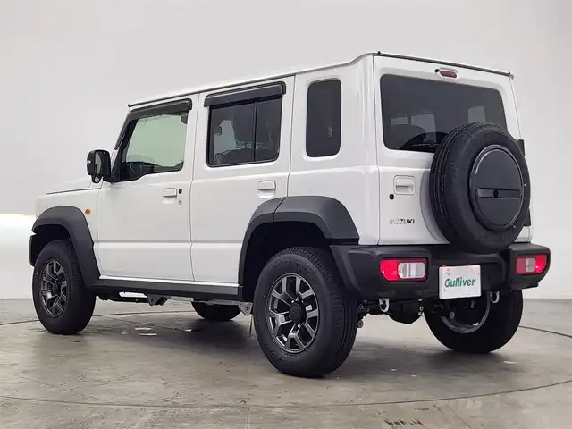 スズキ ジムニー ノマド FC 愛知県 2025(令7)年 0.1千km パール 登録済み未使用車/４ＷＤ/スズキデュアルブレーキサポート/レーダークルーズコントロール/純正8型ナビ/・フルセグ/・Bluetooth/・USB/シートヒーター（D+N)/ミラーヒーター　/パーキングソナー/オートライト/純正１５インチＡＷ/革巻きステアリング/ステアリングリモコン/ダウンヒルアシストコントロール/LEDヘッドライト/スマートキー/Pスタート/横滑り防止装置