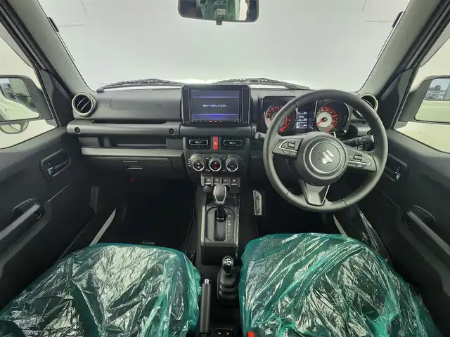 スズキ ジムニー ノマド FC 愛知県 2025(令7)年 0.1千km パール 登録済み未使用車/４ＷＤ/スズキデュアルブレーキサポート/レーダークルーズコントロール/純正8型ナビ/・フルセグ/・Bluetooth/・USB/シートヒーター（D+N)/ミラーヒーター　/パーキングソナー/オートライト/純正１５インチＡＷ/革巻きステアリング/ステアリングリモコン/ダウンヒルアシストコントロール/LEDヘッドライト/スマートキー/Pスタート/横滑り防止装置