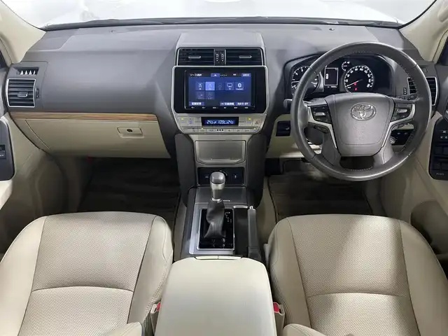 トヨタ ランドクルーザー プラド TX Lパッケージ 大阪府 2022(令4)年 2万km ホワイトパールクリスタルシャイン ベージュ革シート 純正9incナビTV バックカメラ パワーシート/ヒーター/エアコン レーダークルコン 衝突軽減ブレーキ レーンアシスト オートハイビーム ルーフレール クリアランスソナー 4WD
