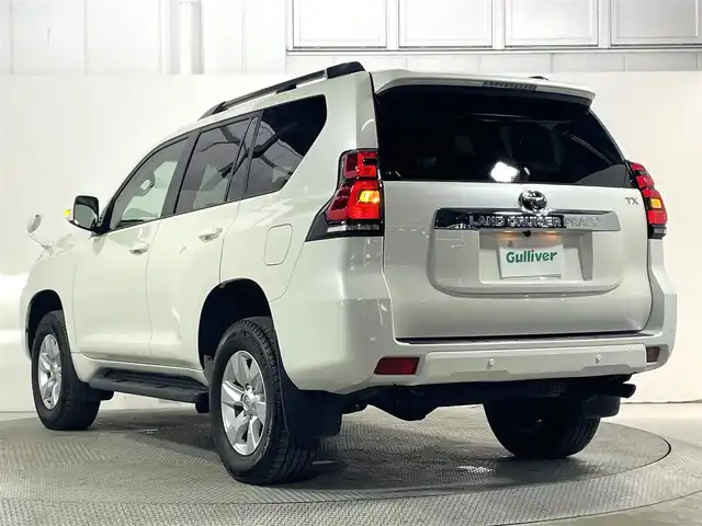 トヨタ ランドクルーザー プラド TX Lパッケージ 大阪府 2022(令4)年 2万km ホワイトパールクリスタルシャイン ベージュ革シート 純正9incナビTV バックカメラ パワーシート/ヒーター/エアコン レーダークルコン 衝突軽減ブレーキ レーンアシスト オートハイビーム ルーフレール クリアランスソナー 4WD