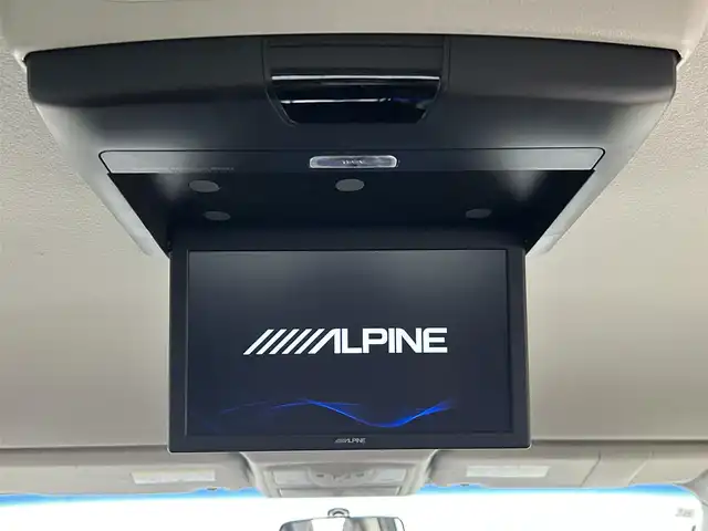 日産 エルグランド 250ハイウェイスターS 岡山県 2017(平29)年 4.7万km ブリリアントホワイトパール 10.1インチフリップダウンモニター/両側電動スライドドア/LEDヘッドライト/バックカメラ/ビルトインETC/オットマン/ハーフレザー/純正アルミホイール/Bluetooth/TV