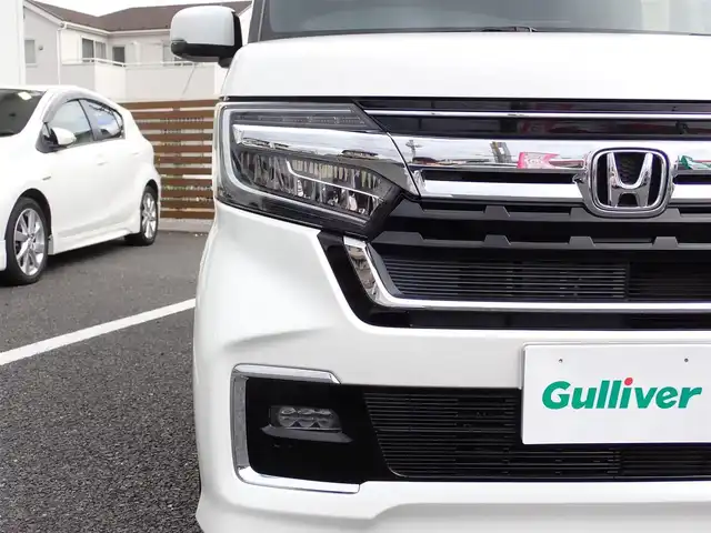 ホンダ Ｎ ＢＯＸ カスタム L ターボ 千葉県 2021(令3)年 1.6万km プラチナホワイトパール 8インチナビ(AVIC-RL811)/・フルセグテレビ/・CD/DVD/・Bluetooth/・ミュージックサーバー/バックカメラ/ドライブレコーダー前後/ETC/ホンダセンシング/・衝突軽減ブレーキ/・誤発進抑制機能/・後方誤発進抑制機能/・歩行者事故低減ステアリング/・路外逸脱抑制機能/・先行車発進お知らせ機能/・標識認識機能/・オートハイビーム/クルーズコントロール/パドルシフト/LEDヘッドライト/LEDフォグライト/両側パワースライドドア /純正15インチAW