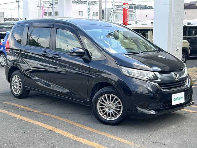 ホンダ フリード＋ G ホンダセンシング 道東・釧路十勝 2018(平30)年 2.2万km プレミアムスパークルブラックパール 4WD/ワンオーナー/純正メモリーナビ/バックカメラ/ホンダセンシング/レーダークルーズコントロール/両側パワースライドドア/LEDヘッドライト/オートライト/前席シートヒーター/ミラーヒーター/スマートキー/エンジンプッシュスタート/取扱説明書/保証書/ナビ取説