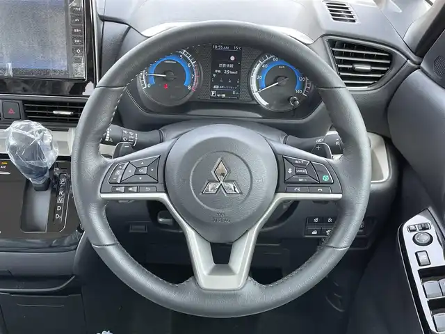 三菱 デリカミニ T プレミアム 道央・札幌 2025(令7)年 0.1万km未満 アメジストブラック ４WD/ワンオーナー/純正ディスプレイオーディオ/AM/FM/BT/MI-PILOT/衝突被害軽減ブレーキ/横滑り防止装置/レーダークルーズコントロール/ダウンヒルアシストコントロール/レーンキープアシスト/クリアランスソナー/マルチアラウンドモニター/デジタルインナーミラー/アイドリングストップ/両側パワースライドドア/前席シートヒーター/ハーフレザーシート/革巻きステアリング/ステアリングリモコン/パドルシフト/ハンドルヒーター/電動パーキング/オートブレーキホールド/プッシュスタート/スマートキー/LEDヘッドライト/オートライト/フォグランプ/ヘッドライトレベライザー/電動格納ミラー/ウィンカーミラー/スペアキー