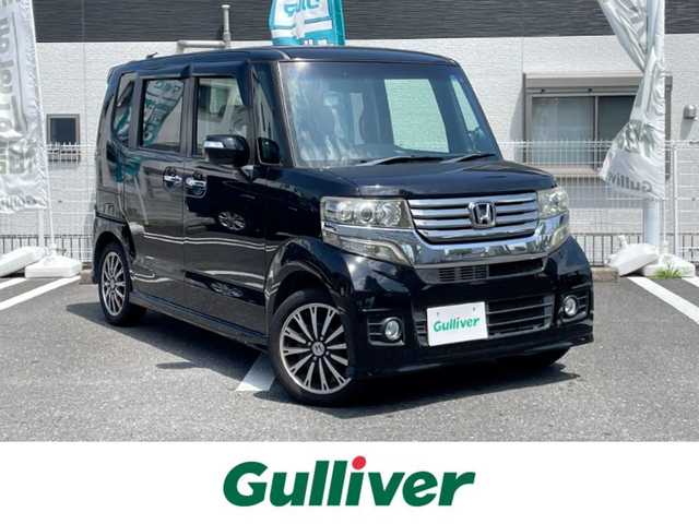 ホンダ Ｎ ＢＯＸ カスタム G ターボパッケージ 三重県 2012(平24)年 12.4万km クリスタルブラックパール 登録時124082km/Strade７インチSDナビ/フルセグ・CD/DVD・HDD・SD・Bluetooth・AM/FM/両側パワースライドドア/パドルシフト/クルーズコントロール/アイドリングストップ/バックカメラ/AUTOライト/革巻きステアリング/ETC/純正フロアマット/純正１５インチアルミホイール/スマートキー/プッシュスタート/スペアキー
