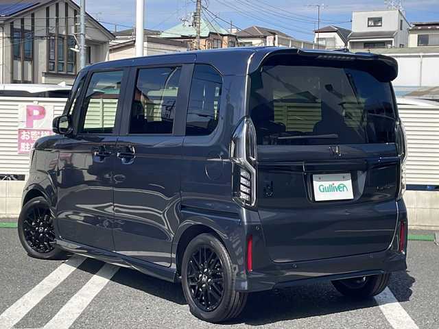 ホンダ Ｎ ＢＯＸ カスタム L ターボ 東京都 2023(令5)年 0.6万km メテオロイドグレーメタリック Gathersナビ　型式：LXU-237NBi/【Bluetooth/TV/DVD/CD/SD】/バックカメラ/ETC/衝突軽減ブレーキ/レーンキープアシスト/クリアランスソナー/レーダークルーズコントロール/電動パーキングブレーキ/両側パワースライドドア/D/N席シートヒーター/プッシュスタート/スマートキー×2/パドルシフト/LEDオートライト