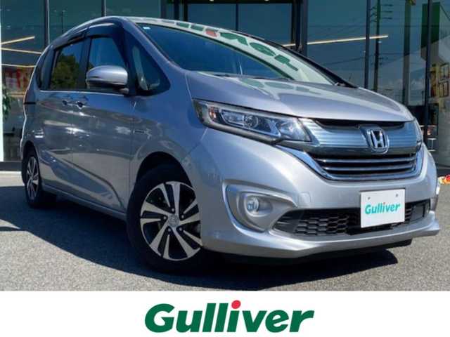 ホンダ フリード＋ ハイブリット EX 兵庫県 2018(平30)年 9.2万km ルナシルバーM 純正７型ナビ/・TV.BT.AM.FM/衝突軽減/レーダークルーズコントロール/バックカメラ/前席シートヒーター/両側パワースライドドア/前後ドラレコ/ビルトインＥＴＣ/前席ゴムマット/ドアバイザー/スペアキー×１