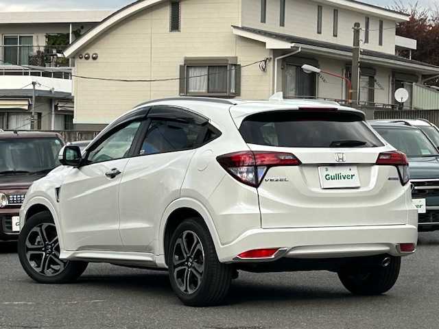 ホンダ ヴェゼル ハイブリッド Z 東京都 2015(平27)年 3.2万km ホワイトオーキッドパール ワンオーナー/純正メモリナビ/AM/FM/CD/DVD/BT/フルセグ/ 『VXM-155VFi』/バックカメラ/シティブレーキアクティブシステム/クルーズコントロール/パドルシフト/DN席シートヒーター/LEDヘッドライト/ドライブレコーダー/ETC/トノカバー/純正フロアマット/スペアキー×1/保証書/取扱説明書