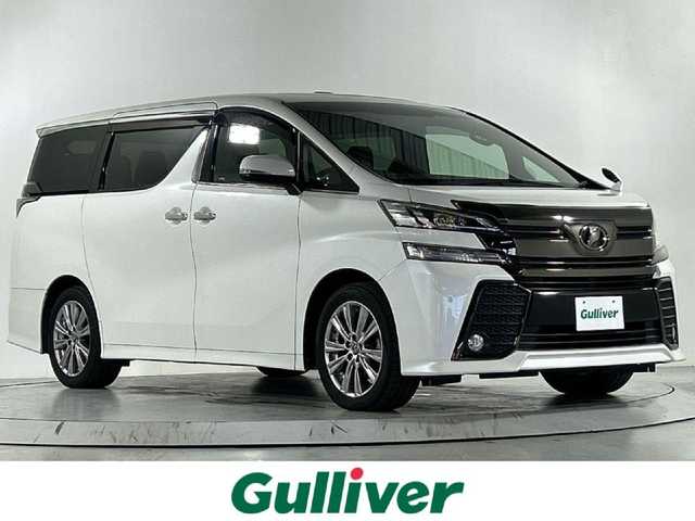 トヨタ ヴェルファイア Z Aエディション ゴールデンアイズ 佐賀県 2016(平28)年 5.2万km ホワイトパールクリスタルシャイン ツインムーンルーフ/ALPINE11インチBIGXナビ/ALPINEフリップダウンモニター/バックカメラ/両側パワースライドドア/クルーズコントロール/コーナーセンサー/ハーフレザーシート/オットマン/電動パーキングブレーキ/オートブレーキホールド/ウッドコンビステアリング/ステアリングスイッチ/プッシュスタート/スマートキー/LEDヘッドライト/フォグライト/純正アルミホイール