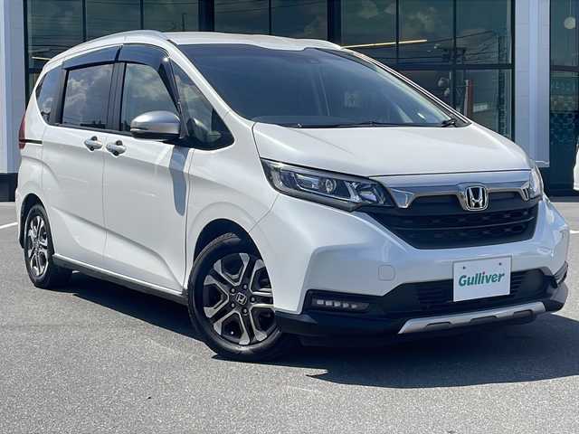 ホンダ フリード＋ クロスター ホンダセンシング 長野県 2020(令2)年 4.3万km プラチナホワイトパール 純正 7インチナビ VXM-204VFi/（CD/DVD/AM/FM/TV/iPod/SD/USB/Bluetooth/AUX）/バックカメラ/両側パワースライドドア/前後ドライブレコーダー/ビルトイン ETC/クロスター専用内外装/Honda SENSING/・衝突軽減ブレーキ［CMBS］/・車線維持支援システム［LKAS］/・アダプティブクルーズコントロール［ACC］/・路外逸脱抑制機能/・先行車発進お知らせ機能/・標識認識機能/ハーフレザーシート/オートライト/LED ヘッドライト/フォグライト/・ステアリングスイッチ/・プッシュスタート/・純正15インチアルミホイール/・スマートキーx2