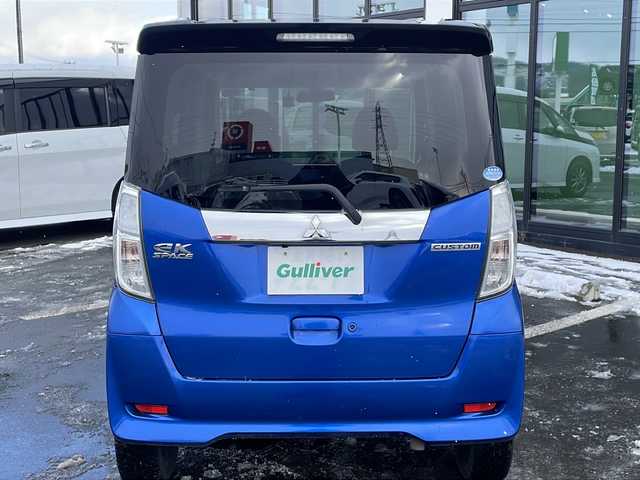 三菱 ｅＫスペース カスタムT e－アシスト 道東・釧路十勝 2018(平30)年 6.3万km 青Ⅱ ・4WD/・純正7インチナビ/（CD USB SD TV)/・両側パワースライドドア/・バックカメラ/・クルーズコントロール/・アイドリングストップ/・横滑り防止装置/・衝突被害軽減ブレーキ/・D席シートヒーター/・社外前方ドライブレコーダー/・社外フロアマット/・プッシュスタート/・HIDヘッドライト/・オートライト/・スマートキー/・純正エンジンスターター/・純正アルミホイール付夏タイヤ積込