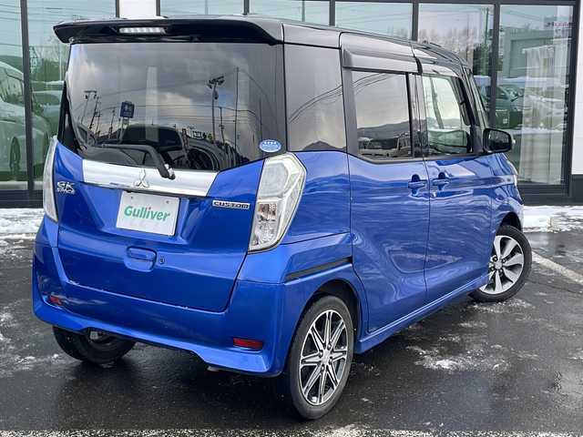 三菱 ｅＫスペース カスタムT e－アシスト 道東・釧路十勝 2018(平30)年 6.3万km 青Ⅱ ・4WD/・純正7インチナビ/（CD USB SD TV)/・両側パワースライドドア/・バックカメラ/・クルーズコントロール/・アイドリングストップ/・横滑り防止装置/・衝突被害軽減ブレーキ/・D席シートヒーター/・社外前方ドライブレコーダー/・社外フロアマット/・プッシュスタート/・HIDヘッドライト/・オートライト/・スマートキー/・純正エンジンスターター/・純正アルミホイール付夏タイヤ積込