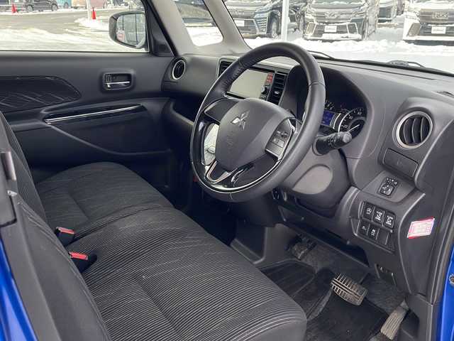 三菱 ｅＫスペース カスタムT e－アシスト 道東・釧路十勝 2018(平30)年 6.3万km 青Ⅱ ・4WD/・純正7インチナビ/（CD USB SD TV)/・両側パワースライドドア/・バックカメラ/・クルーズコントロール/・アイドリングストップ/・横滑り防止装置/・衝突被害軽減ブレーキ/・D席シートヒーター/・社外前方ドライブレコーダー/・社外フロアマット/・プッシュスタート/・HIDヘッドライト/・オートライト/・スマートキー/・純正エンジンスターター/・純正アルミホイール付夏タイヤ積込