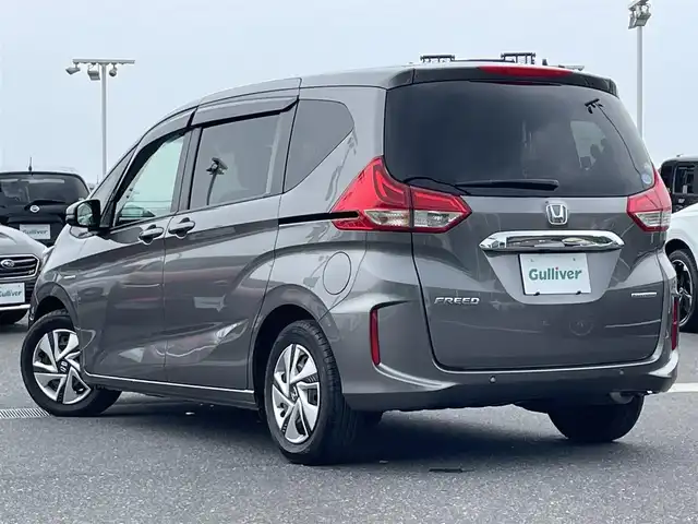 ホンダ フリード ハイブリット G ホンダセンシング 島根県 2020(令2)年 3.1万km スーパープラチナグレーメタリック ワンオーナー /純正9インチナビ/CD/DVD/DTV/Bluetooth/USB/バックカメラ/レーダークルーズコントロール/両側パワースライドドア /シートヒーター /LEDオートライト/ステアリングスイッチ/純正ホイール付きスタッドレス積込/ビルトインETC/前後ドライブレコーダー/スマートキー/スペアキー /プッシュスタート /純正フロアマット/ドアバイザー/電動格納ミラー/フロントワイパーデアイサー
