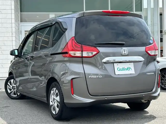 ホンダ フリード ハイブリット G ホンダセンシング 兵庫県 2020(令2)年 3.1万km スーパープラチナグレーメタリック ワンオーナー /純正9インチナビ/CD/DVD/DTV/Bluetooth/USB/バックカメラ/レーダークルーズコントロール/両側パワースライドドア /シートヒーター /LEDオートライト/ステアリングスイッチ/純正ホイール付きスタッドレス積込/ビルトインETC/前後ドライブレコーダー/スマートキー/スペアキー /プッシュスタート /純正フロアマット/ドアバイザー/電動格納ミラー/フロントワイパーデアイサー