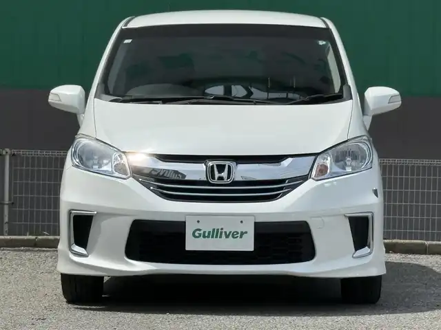 ホンダ フリード ハイブリット ジャストセレクション 千葉県 2016(平28)年 9.2万km ホワイトオーキッドパール 純正ナビ/DVD/CD/BT/フルセグTV/両側パワースライドドア/クルーズコントロール/ワンオーナー/バックカメラ/ETC/横滑り防止装置/オートライト/キセノンヘッドライト/3列シート/スマートキー