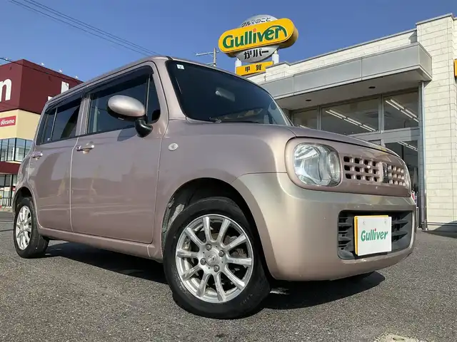 スズキ ラパン G 滋賀県 2015(平27)年 12.9万km シャンパンピンクPM 車検8年2月まで/メモリナビ/　ワンセグテレビ/プッシュスタート/ETC/保証書/取扱説明書