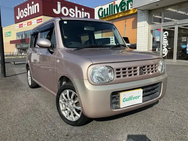 スズキ ラパン G 滋賀県 2015(平27)年 12.9万km シャンパンピンクPM 車検8年2月まで/メモリナビ/　ワンセグテレビ/プッシュスタート/ETC/保証書/取扱説明書
