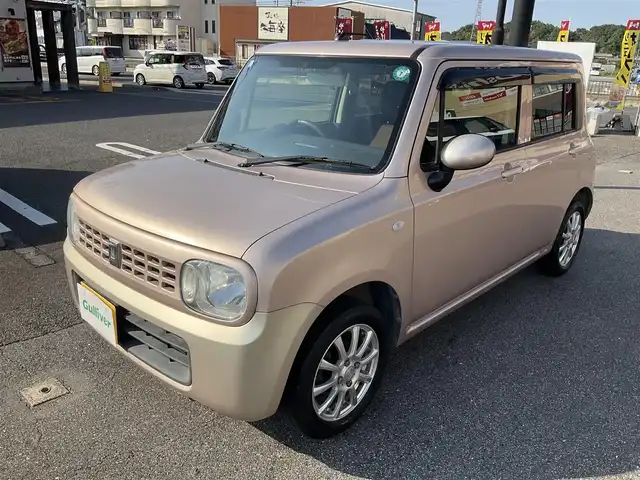 スズキ ラパン G 滋賀県 2015(平27)年 12.9万km シャンパンピンクPM 車検8年2月まで/メモリナビ/　ワンセグテレビ/プッシュスタート/ETC/保証書/取扱説明書