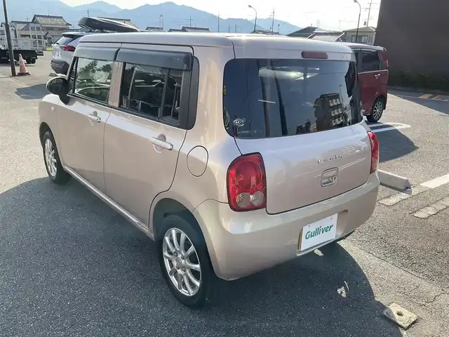 スズキ ラパン G 滋賀県 2015(平27)年 12.9万km シャンパンピンクPM 車検8年2月まで/メモリナビ/　ワンセグテレビ/プッシュスタート/ETC/保証書/取扱説明書