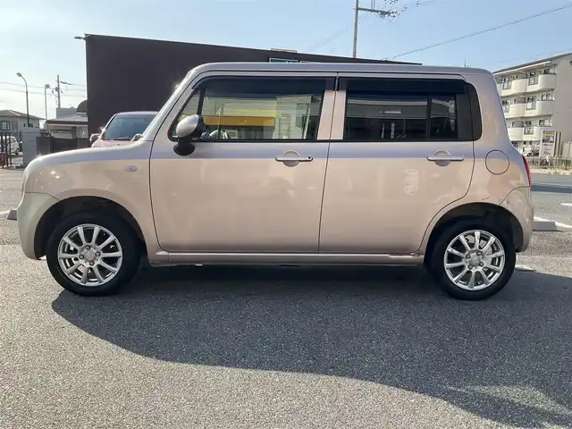 スズキ ラパン G 滋賀県 2015(平27)年 12.9万km シャンパンピンクPM 車検8年2月まで/メモリナビ/　ワンセグテレビ/プッシュスタート/ETC/保証書/取扱説明書