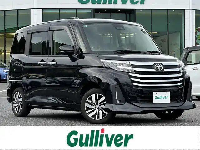 トヨタ ルーミー カスタムG 島根県 2021(令3)年 8.4万km ブラックマイカメタリック 登録時走行距離 83650Km/取扱説明書【車両/ナビ】/保証書/純正9インチディスプレイオーディオ/バックカメラ/両側パワースライドドア/レーダークルーズコントロール/コーナーセンサー/シートヒーター/オートライト/プッシュスタート/純正14インチアルミ