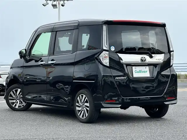 トヨタ ルーミー カスタムG 島根県 2021(令3)年 8.4万km ブラックマイカメタリック 登録時走行距離 83650Km/取扱説明書【車両/ナビ】/保証書/純正9インチディスプレイオーディオ/バックカメラ/両側パワースライドドア/レーダークルーズコントロール/コーナーセンサー/シートヒーター/オートライト/プッシュスタート/純正14インチアルミ