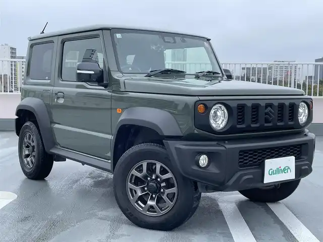 スズキ ジムニー シエラ JC 東京都 2018(平30)年 4.8万km ジャングルグリーン ４WD/純正メモリーナビ（AVIC-RL802)/バックカメラ/D・N席シートヒーター/純正１５インチアルミ/ビルトインETC/電動格納ミラー/背面タイヤ/フォグランプ/エンジンプッシュボタン/クルーズコントロール/ABS/Wエアバック/スズキセーフティーサポート/レーザーレーダー・単眼カメラ/デュアルセンサーブレーキサポート/誤発進抑制/車線逸脱警報/ふらつき警報/先行車発進お知らせ/標識認識機能/スペアキー１本/保証書・取説