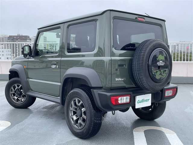 スズキ ジムニー シエラ JC 東京都 2018(平30)年 4.8万km ジャングルグリーン ４WD/純正メモリーナビ（AVIC-RL802)/バックカメラ/D・N席シートヒーター/純正１５インチアルミ/ビルトインETC/電動格納ミラー/背面タイヤ/フォグランプ/エンジンプッシュボタン/クルーズコントロール/ABS/Wエアバック/スズキセーフティーサポート/レーザーレーダー・単眼カメラ/デュアルセンサーブレーキサポート/誤発進抑制/車線逸脱警報/ふらつき警報/先行車発進お知らせ/標識認識機能/スペアキー１本/保証書・取説