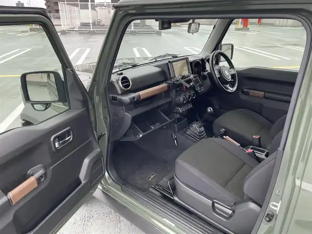 スズキ ジムニー シエラ JC 東京都 2018(平30)年 4.8万km ジャングルグリーン ４WD/純正メモリーナビ（AVIC-RL802)/バックカメラ/D・N席シートヒーター/純正１５インチアルミ/ビルトインETC/電動格納ミラー/背面タイヤ/フォグランプ/エンジンプッシュボタン/クルーズコントロール/ABS/Wエアバック/スズキセーフティーサポート/レーザーレーダー・単眼カメラ/デュアルセンサーブレーキサポート/誤発進抑制/車線逸脱警報/ふらつき警報/先行車発進お知らせ/標識認識機能/スペアキー１本/保証書・取説
