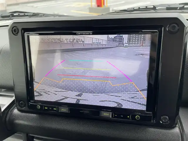 スズキ ジムニー シエラ JC 東京都 2018(平30)年 4.8万km ジャングルグリーン ４WD/純正メモリーナビ（AVIC-RL802)/バックカメラ/D・N席シートヒーター/純正１５インチアルミ/ビルトインETC/電動格納ミラー/背面タイヤ/フォグランプ/エンジンプッシュボタン/クルーズコントロール/ABS/Wエアバック/スズキセーフティーサポート/レーザーレーダー・単眼カメラ/デュアルセンサーブレーキサポート/誤発進抑制/車線逸脱警報/ふらつき警報/先行車発進お知らせ/標識認識機能/スペアキー１本/保証書・取説
