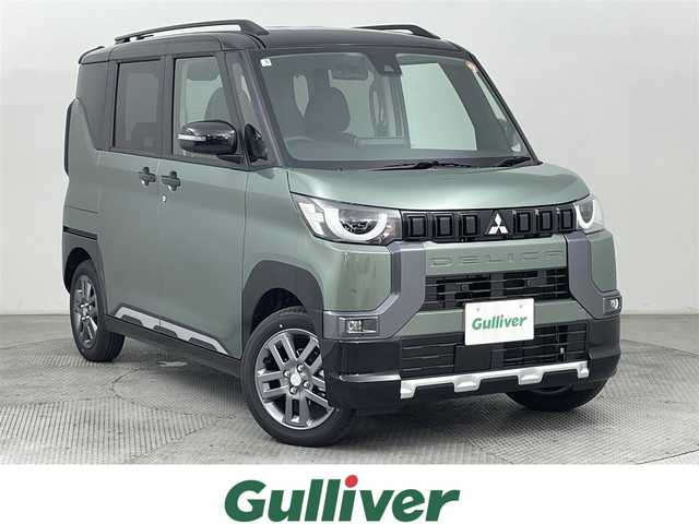 三菱 デリカミニ T プレミアム 道央・札幌 2025(令7)年 0.1万km未満 緑 ・届出済未使用車/・4WD/・寒冷地仕様/・純正カーオーディオ/・BT/USB/AppleCarPlay/・マルチアラウンドモニター/・自動防眩＋デジタルインナーミラー/・e-Assist/・衝突被害軽減ブレーキシステム/・レーダークルーズコントロール/・レーンキープアシスト/・コーナーセンサー/・横滑り防止装置/・オートマチックハイビーム/・LEDヘッドライト/・オートライト/・両側パワースライドドア/・アイドリングストップ/・ハーフレザーシート/・前席シートヒーター/・純正15インチAW/・プッシュスタート/・スマートキー/・スペアキー/・保証書/・取扱説明書
