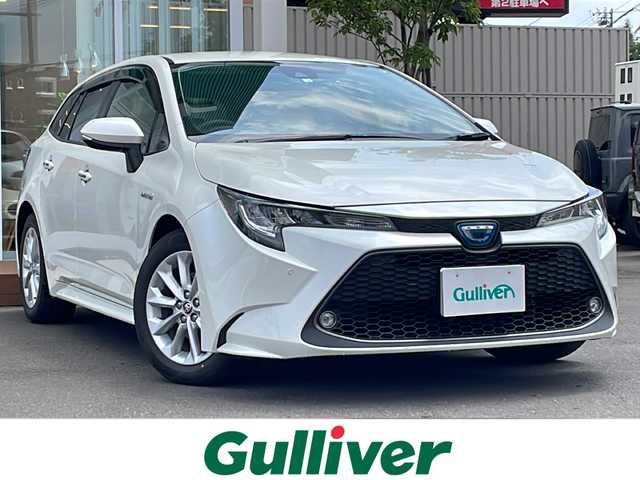 トヨタ カローラツーリング ハイブリッド S 道央・札幌 2020(令2)年 3.9万km ホワイトパールクリスタルシャイン ・４WD/・衝突軽減ブレーキ/・寒冷地仕様/・純正ディスプレイオーディオ/　CD＆DVD＆BT/・バックカメラ/・コーナーセンサー/・レーンキープアシスト/・レーダークルーズコントロール/・オートライト/・オートエアコン/・オートリトラミラー/・ミラーヒーター/・ワイパー熱線/・ビルトインETC/・前後ドライブレコーダー/・エンジンスターター/・プッシュスタート/・スマートキー/・ハンズフリー/・ステアリングスイッチ/・社外AW＆冬タイヤ積込/　205/55/16  2024年　6分山/・純正フロアマット/・ドアバイザー/・ウィンカーミラー/・フォグライト/・スペアキー