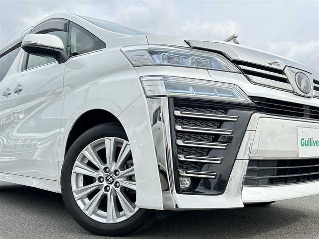 トヨタ ヴェルファイア Z 佐賀県 2019(令1)年 2.3万km ホワイトパールクリスタルシャイン トヨタセーフティセンス/プリクラッシュセーフティ/レーンキープアシスト/コーナーセンサー/レーダークルーズコントロール/純正10.5インチメモリナビゲーション【NSZN-Z68T】/CD DVD Bluetooth フルセグ/純正12.1インチフリップダウンモニター/両側パワースライドドア/ビルトインETC/バックカメラ/オットマン/純正LEDヘッドライト/フォグランプ/純正フロアマット/純正18インチAW/オートハイビーム/プッシュスタート/スマートキー/スペアキー/保証書/取扱説明書