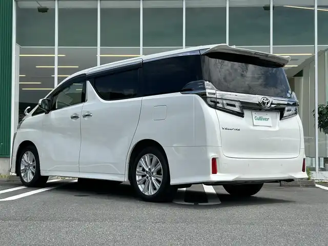 トヨタ ヴェルファイア Z 愛媛県 2019(令1)年 2.3万km ホワイトパールクリスタルシャイン 純正10.5インチメモリナビ【NSZN-Z68T】/純正12.1インチフリップダウンモニター/・CD/DVD /・Bluetooth /フルセグTV/バックカメラ/両側パワースライドドア/ビルトインETC/トヨタセーフティセンス/プリクラッシュセーフティ/レーンキープアシスト/コーナーセンサー/レーダークルーズコントロール/オットマン/純正LEDヘッドライト/フォグランプ/純正フロアマット/純正18インチAW/オートハイビーム/プッシュスタート/スマートキー/スペアキー/保証書/取扱説明書