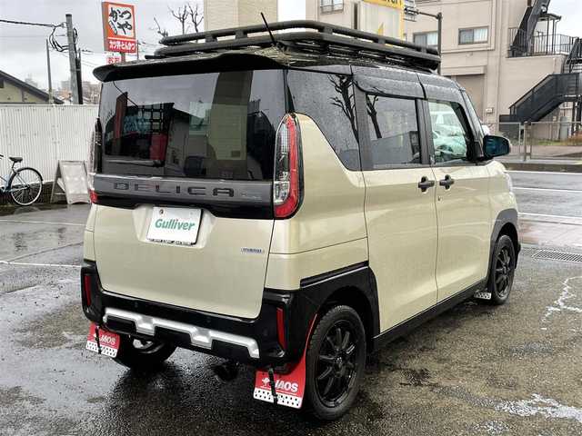 三菱 デリカミニ T プレミアム 神奈川県 2023(令5)年 0.2万km アイボリーⅡ 2インチリフトUP/社外15インチAW/JAOSマッドフラップ/ルーフラック/バンパーガード/MI-PILOT/レーダークルーズコントロール/衝突軽減ブレーキ/LKA/デジタルインナーミラー/社外9インチメモリーナビ・地デジTV/社外CD/DVD/SD/MSV/USB/BT/全方位カメラ/ETC/前後ドライブレコーダー/革調シートカバー/前席シートヒーター/ステアリングヒーター/ヒルディセントコントロール/LEDライト/LEDフォグ/コーナーセンサー/プッシュスタート/スマートキー×2/パドルシフト/保証書・取説あり