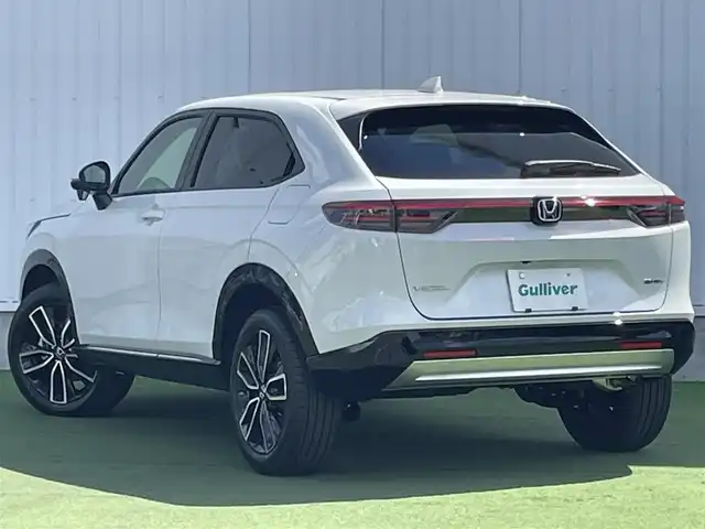 ホンダ ヴェゼル ハイブリッド e:HEV Z 香川県 2025(令7)年 0.1千km プラチナホワイトパール 登録時走行距離：3km/ホンダセンシング/純正9インチナビ/ホンダコネクトディスプレイ/ワイヤレス充電/バックカメラ/レーダークルーズコントロール/ダウンヒルアシストコントロール/前席シートヒーター/革巻きステアリング/ステアリングリモコン/レーダークルーズコントロール/ブラインドスポットモニター/オートハイビーム/LEDヘッドライト/フォグライト/ETC2.0/純正18インチアルミホイール/ハーフレザー/スマートキー/プッシュスタート/Bluetooth/電動格納ウィンカーミラー/ISOFIX
