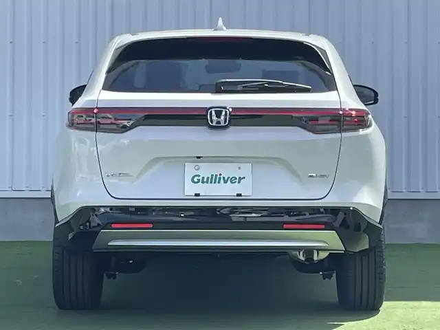 ホンダ ヴェゼル ハイブリッド e:HEV Z 香川県 2025(令7)年 0.1千km プラチナホワイトパール 登録時走行距離：3km/ホンダセンシング/純正9インチナビ/ホンダコネクトディスプレイ/ワイヤレス充電/バックカメラ/レーダークルーズコントロール/ダウンヒルアシストコントロール/前席シートヒーター/革巻きステアリング/ステアリングリモコン/レーダークルーズコントロール/ブラインドスポットモニター/オートハイビーム/LEDヘッドライト/フォグライト/ETC2.0/純正18インチアルミホイール/ハーフレザー/スマートキー/プッシュスタート/Bluetooth/電動格納ウィンカーミラー/ISOFIX
