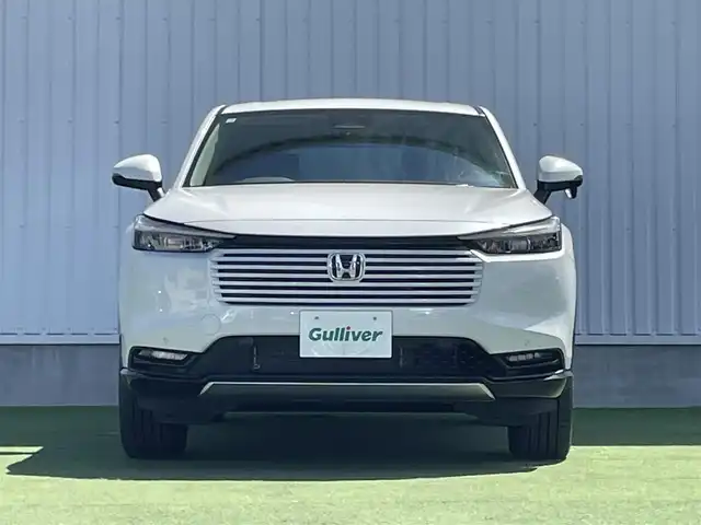 ホンダ ヴェゼル ハイブリッド e:HEV Z 香川県 2025(令7)年 0.1千km プラチナホワイトパール 登録時走行距離：3km/ホンダセンシング/純正9インチナビ/ホンダコネクトディスプレイ/ワイヤレス充電/バックカメラ/レーダークルーズコントロール/ダウンヒルアシストコントロール/前席シートヒーター/革巻きステアリング/ステアリングリモコン/レーダークルーズコントロール/ブラインドスポットモニター/オートハイビーム/LEDヘッドライト/フォグライト/ETC2.0/純正18インチアルミホイール/ハーフレザー/スマートキー/プッシュスタート/Bluetooth/電動格納ウィンカーミラー/ISOFIX