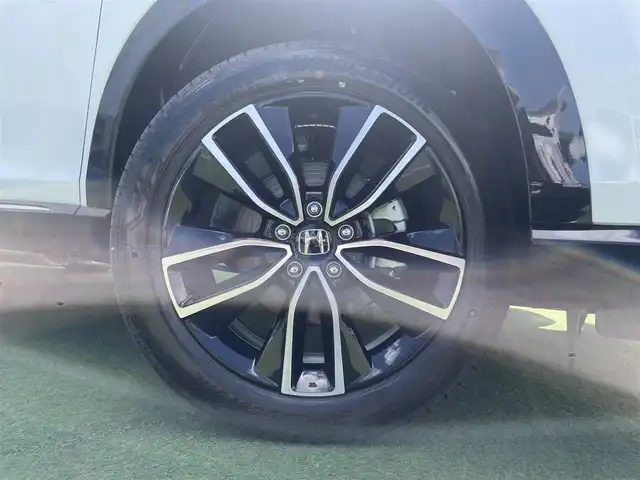 ホンダ ヴェゼル ハイブリッド e:HEV Z 香川県 2025(令7)年 0.1千km プラチナホワイトパール 登録時走行距離：3km/ホンダセンシング/純正9インチナビ/ホンダコネクトディスプレイ/ワイヤレス充電/バックカメラ/レーダークルーズコントロール/ダウンヒルアシストコントロール/前席シートヒーター/革巻きステアリング/ステアリングリモコン/レーダークルーズコントロール/ブラインドスポットモニター/オートハイビーム/LEDヘッドライト/フォグライト/ETC2.0/純正18インチアルミホイール/ハーフレザー/スマートキー/プッシュスタート/Bluetooth/電動格納ウィンカーミラー/ISOFIX