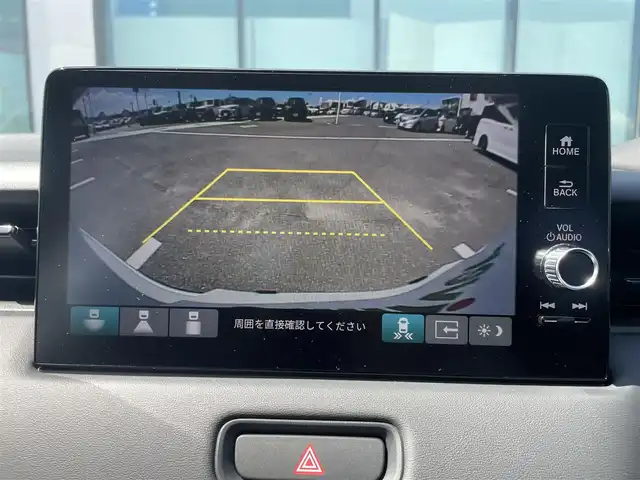 ホンダ ヴェゼル ハイブリッド e:HEV Z 香川県 2025(令7)年 0.1千km プラチナホワイトパール 登録時走行距離：3km/ホンダセンシング/純正9インチナビ/ホンダコネクトディスプレイ/ワイヤレス充電/バックカメラ/レーダークルーズコントロール/ダウンヒルアシストコントロール/前席シートヒーター/革巻きステアリング/ステアリングリモコン/レーダークルーズコントロール/ブラインドスポットモニター/オートハイビーム/LEDヘッドライト/フォグライト/ETC2.0/純正18インチアルミホイール/ハーフレザー/スマートキー/プッシュスタート/Bluetooth/電動格納ウィンカーミラー/ISOFIX