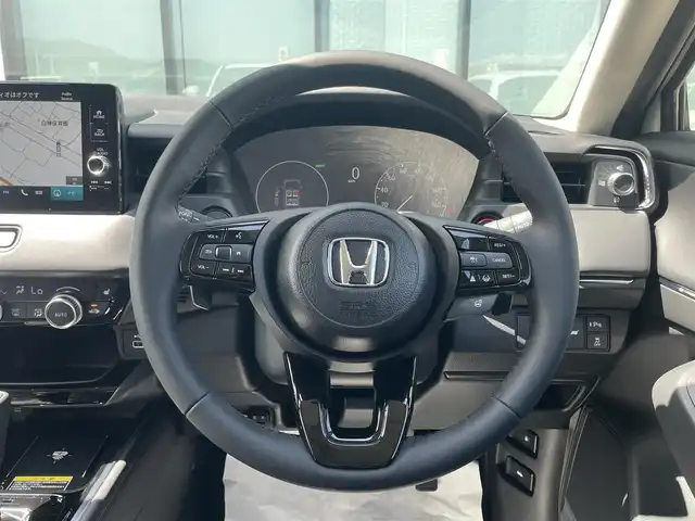 ホンダ ヴェゼル ハイブリッド e:HEV Z 香川県 2025(令7)年 0.1千km プラチナホワイトパール 登録時走行距離：3km/ホンダセンシング/純正9インチナビ/ホンダコネクトディスプレイ/ワイヤレス充電/バックカメラ/レーダークルーズコントロール/ダウンヒルアシストコントロール/前席シートヒーター/革巻きステアリング/ステアリングリモコン/レーダークルーズコントロール/ブラインドスポットモニター/オートハイビーム/LEDヘッドライト/フォグライト/ETC2.0/純正18インチアルミホイール/ハーフレザー/スマートキー/プッシュスタート/Bluetooth/電動格納ウィンカーミラー/ISOFIX