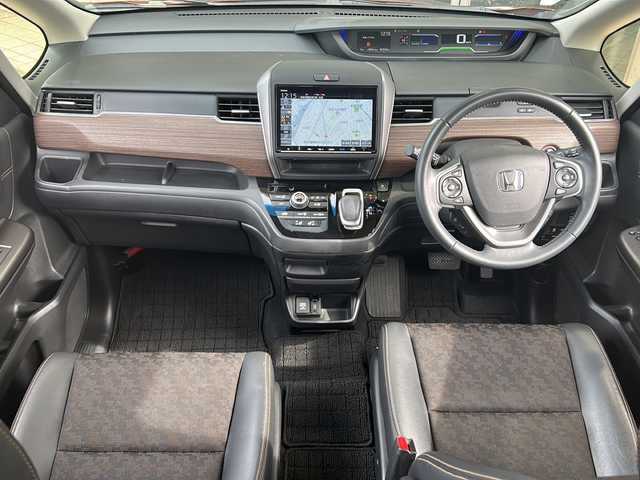 ホンダ フリード ハイブリット クロスター ホンダセンシング 静岡県 2021(令3)年 2.4万km プレミアムクリスタルオレンジM 純正ナビ/CD/DVD/AM/FM/フルセグ/SD/Bluetooth/USB/ipod/主要装備/・純正ナビ　/・ドライブレコーダー　/・シートヒーター　/・レーダークルーズコントロール　/・スマートキー　/・両側パワースライドドア　/・ＥＴＣ　/・バックカメラ　/・ステアリングリモコン　/・レーンキープ　/・プッシュスタート　/・純正アルミホイール/・純正フロアマット/・LEDヘッドライト/・フォグランプ/・アイドリングストップ/・ハーフレザーシート