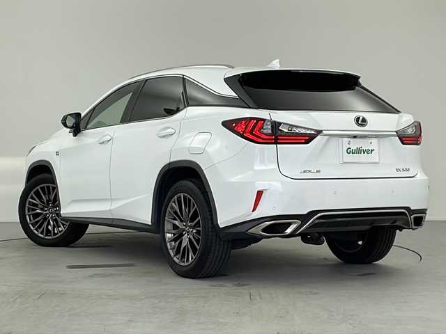 レクサス ＲＸ 300 Fスポーツ 愛知県 2018(平30)年 6.4万km ホワイトノーヴァガラスフレーク 純正ナビ（BT・DVD・CD・TV・AM・FM・USB・AUX）/パノラミックビューモニター/パノラマルーフ/前後ドラレコ/ETC/レーダークルーズコントロール/ヘッドアップディスプレイ/三眼ＬＥＤヘッドライト/LEDオートライト/オートマチックハイビーム/フロントフォグ/パワーバックドア/ブラインドスポットモニター/ルーフレール/コーナーセンサー/前席パワーシート（Ｄ席メモリ付き）/シートヒーター/エアーシート/ステアリングヒーター/赤レザーシート/革巻きステアリング/横滑り防止/レーンアシスト/アイドリングストップ/レクサスセーフティー/ＡＣ１００Ｖ充電/純正ホイール/電格ミラー