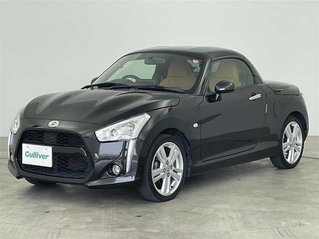 ダイハツ コペン ローブ 大分県 2014(平26)年 7.7万km ブラックマイカメタリック 電動開閉ルーフ/社外メモリナビ/　（SD/メモリ/CD/DVD/TV/FM/AM/BT）/バックカメラ/革巻きステアリング/クロムメッキシフトノブ/エマージェンシーストップシグナル/前席シートヒーター/アイドリングストップ/LEDヘッドライト/フロントフォグランプ/純正AW付サマータイヤ/　（165/50R16）/横滑り防止装置/ダブルエアバック/ABS