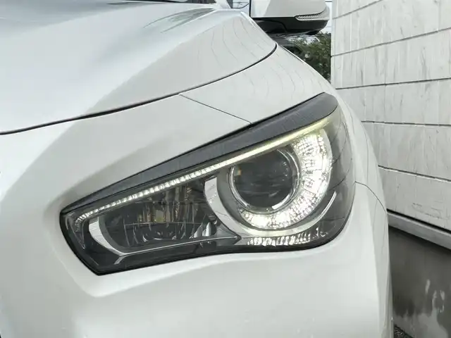 日産 スカイライン 200GT－t 埼玉県 2015(平27)年 1.9万km クリスタルホワイトパール ワンオーナー/登録時走行18514km/車検R8年1月まで/OPサンルーフ/RAYS19インチアルミ/メーカー純正ナビ/フルセグTV/JESテレビキャンセラー/CD/DVD/Bluetooth/アラウンドビューモニター/クルーズコントロール/ビルトインETC/ドライブレコーダー/D/N席パワーシート/クリアランスソナー/ハーフレザー/アイドリングストップ/LEDヘッドライト/フォグランプ/オートライト/スマートキー/プッシュスタート/純正フロアマット/ドアバイザー/横滑り防止システム/電動格納ウィンカーミラー/新車保証書/取扱説明書
